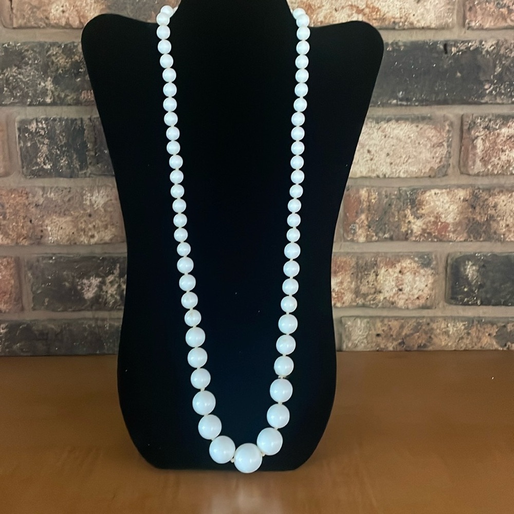 Vintage knotted graduated white faux pearl necklace